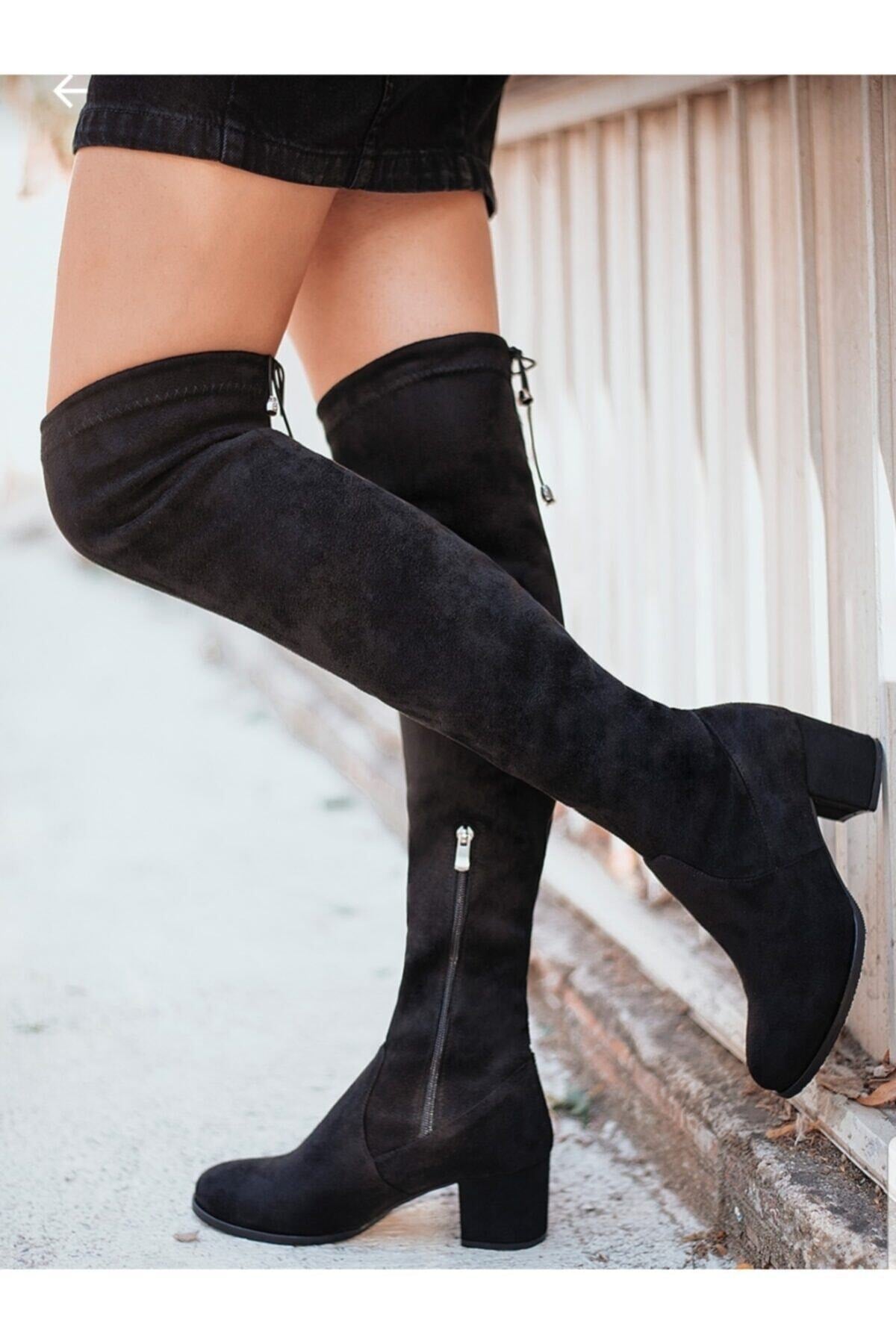 Woman black suede stretch boot