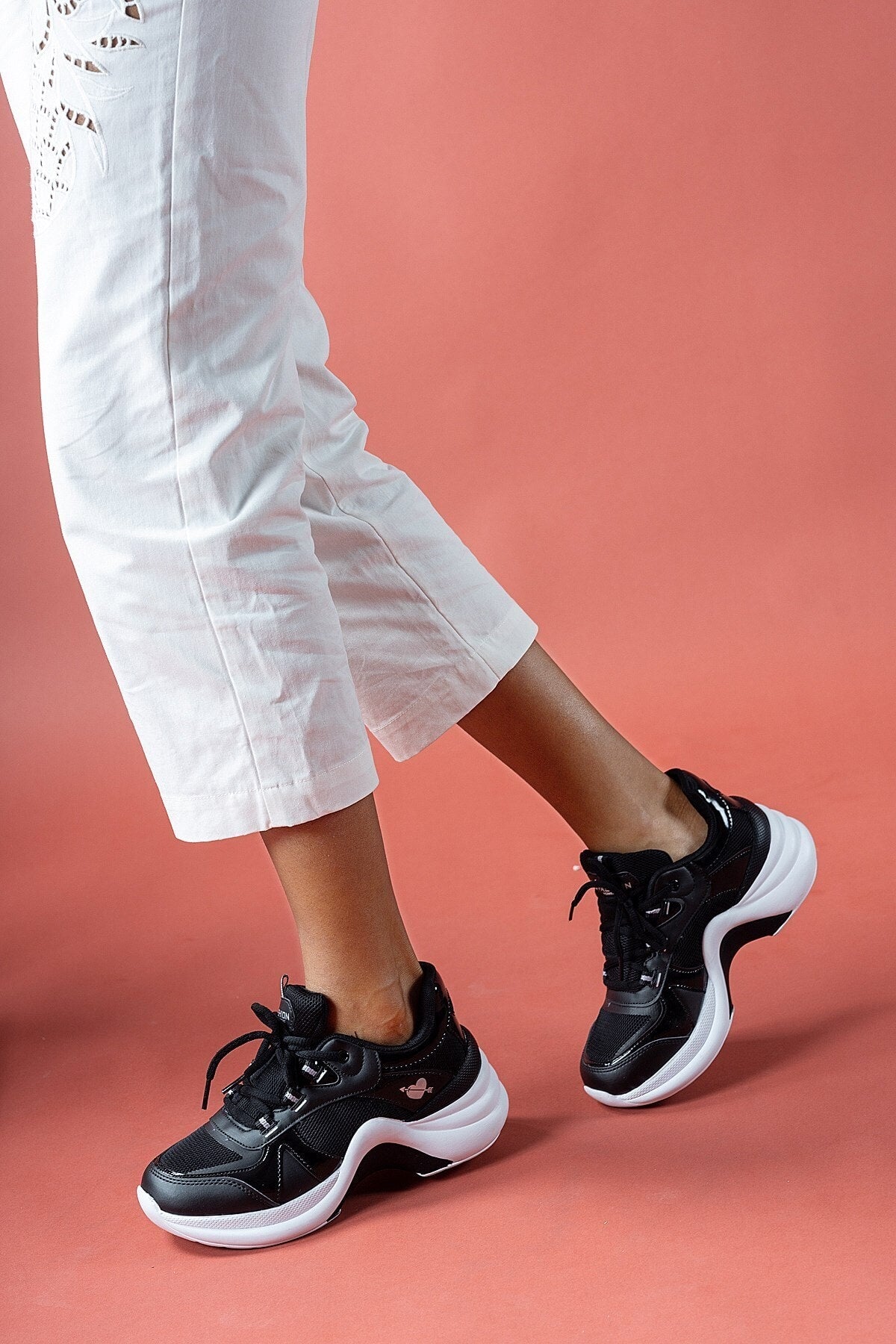 Black and white woman sneaker