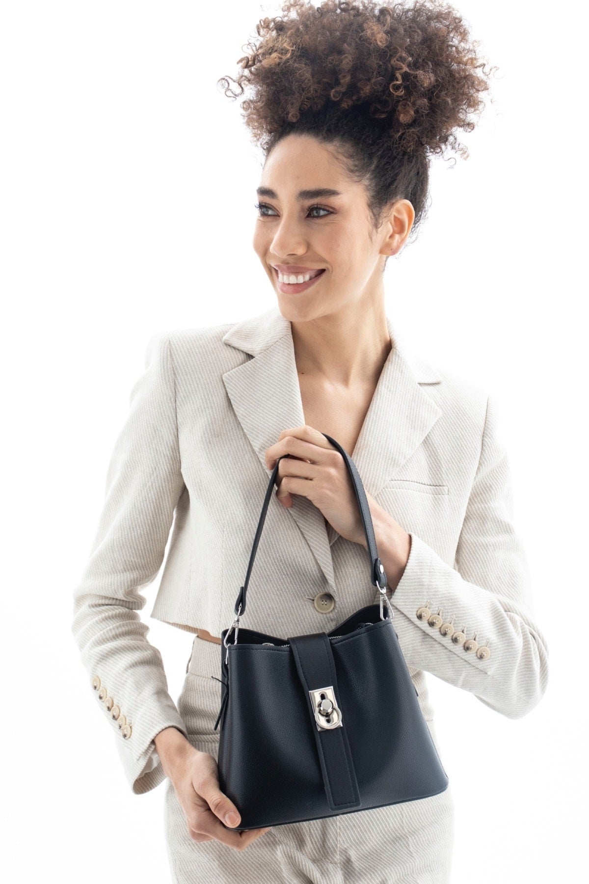 Female black lock detailed strap cross bag